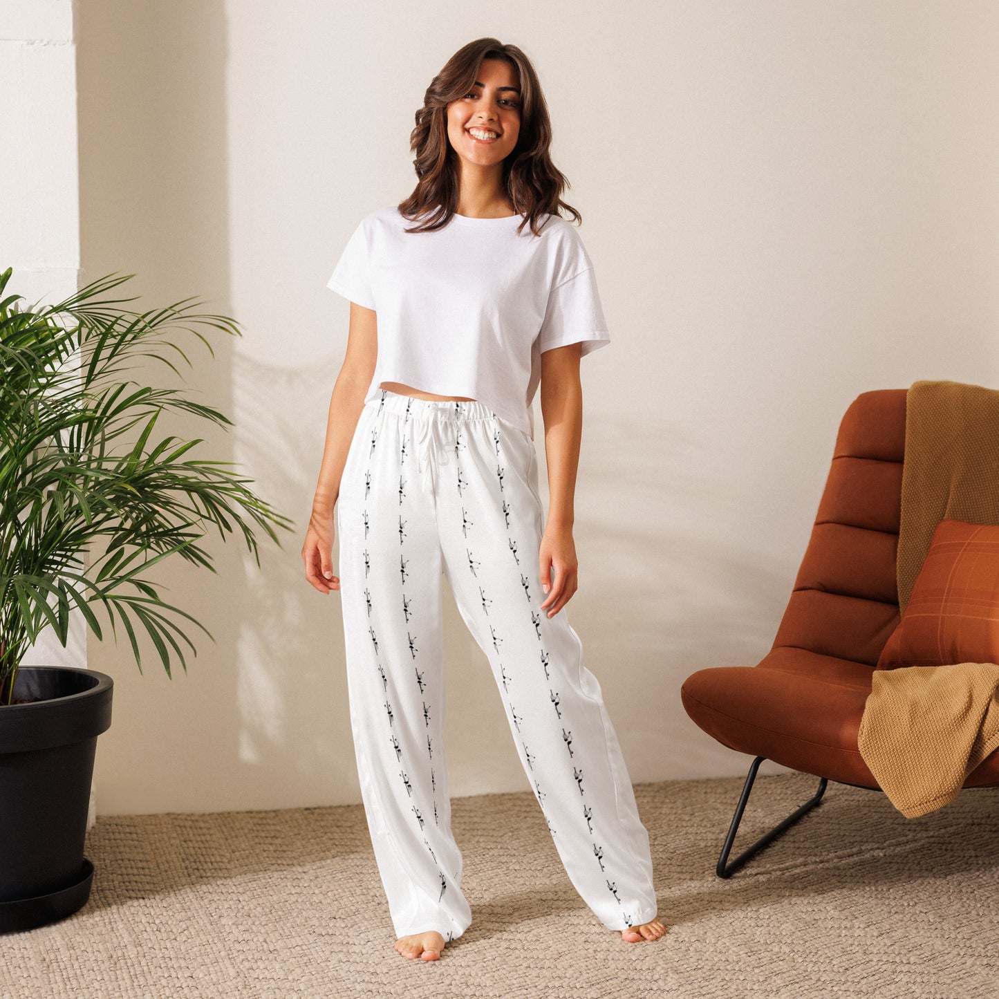 Soft and comfortable women's pajama pants featuring a pole dance graphic design, perfect for lounging or relaxing, ideal for pole dancers and fitness enthusiasts.